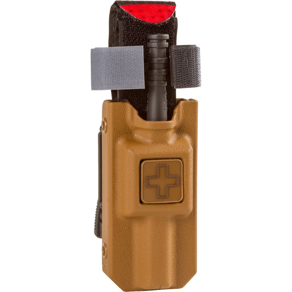 Coyote tan rigid tourniquet case holding a C-A-T Combat Application Tourniquet with medical cross identifier patch on front